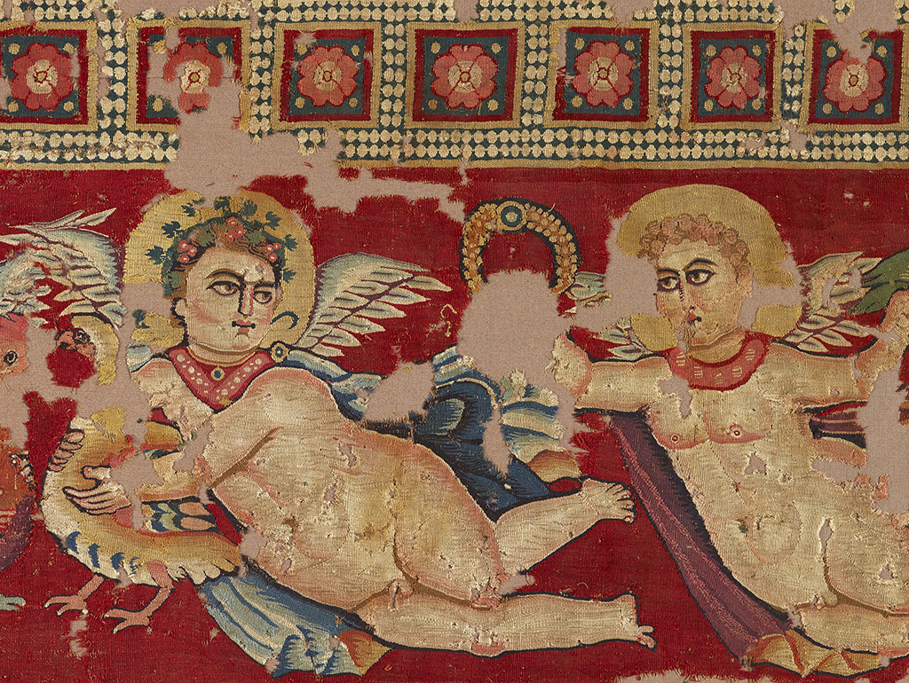 Detail of a textile showing erotes with garlands