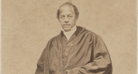 Historical, sepia-colored portrait photograph of Grimes