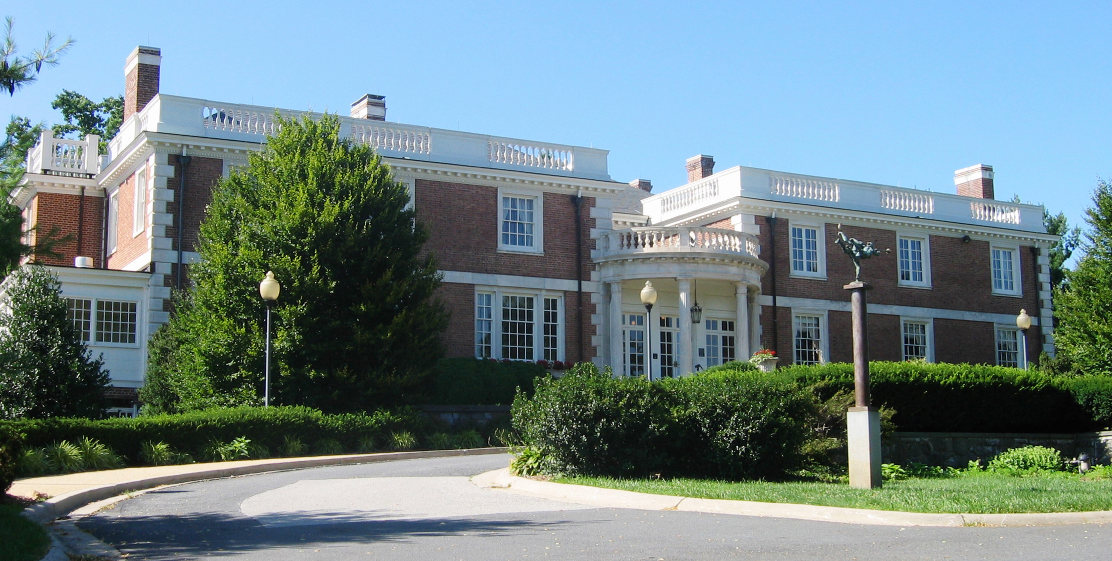 Brick mansion on a sunny day.