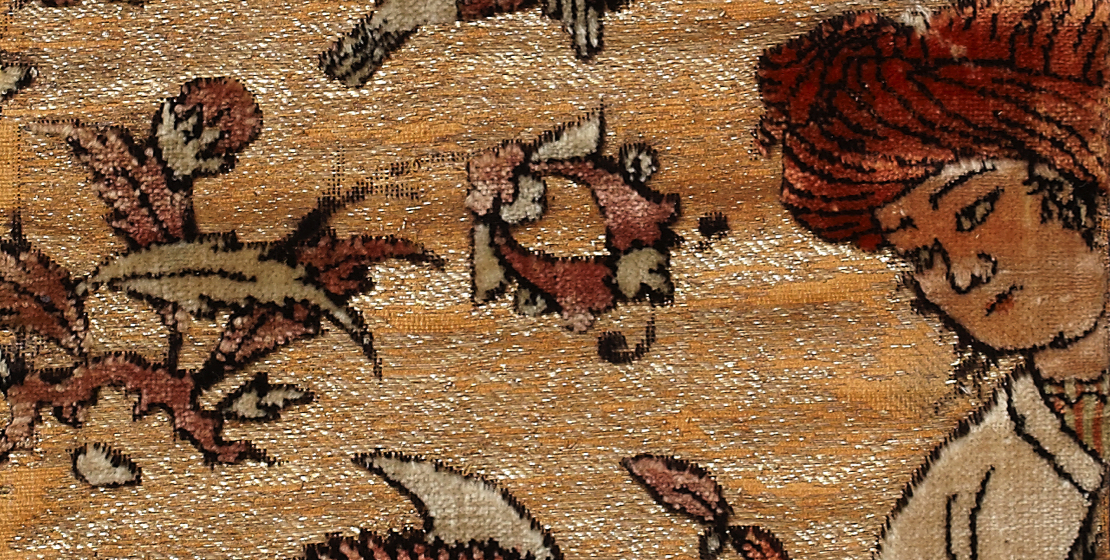 Detail of velvet fragment depicting a person in a red turban