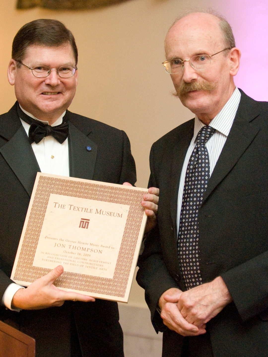 Jon Thompson receives the Myers Award from Bruce Baganz