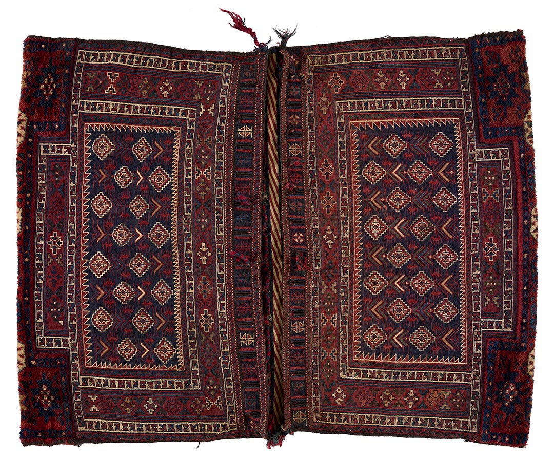 Woven saddlebag laid open to show both sides