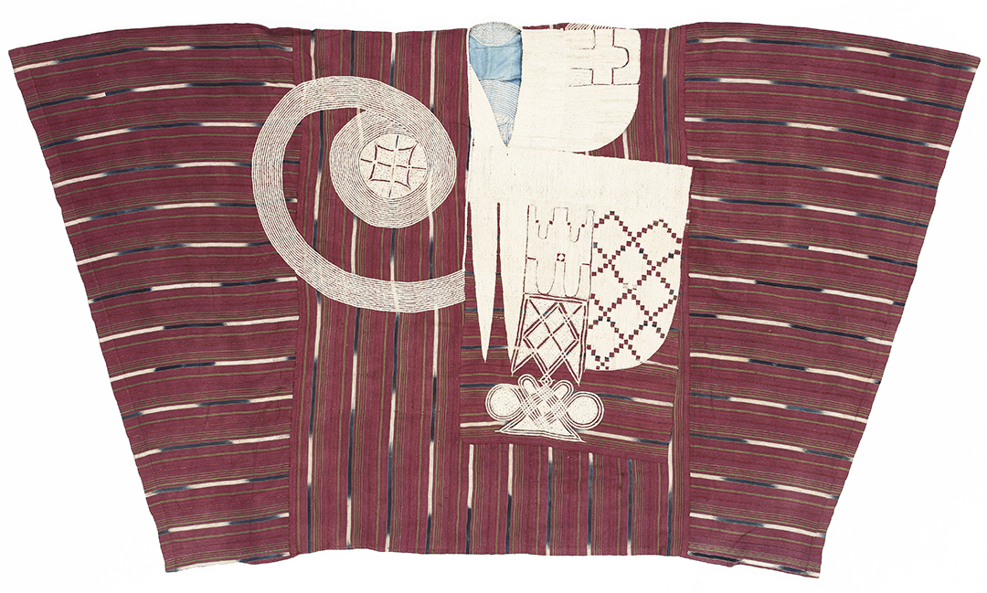 Red poncho with white dashes