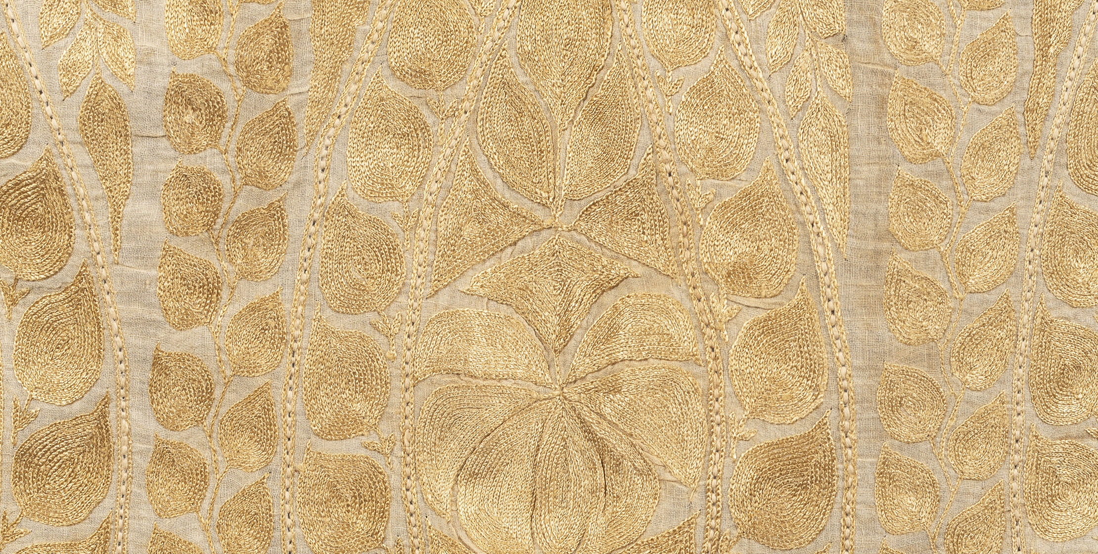 Textile with golden Muro embroidery