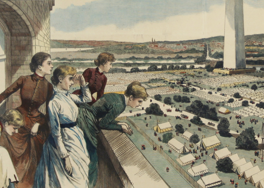 Historical newspaper image of four women leaning out over a balcony, looking at the Washington Monument