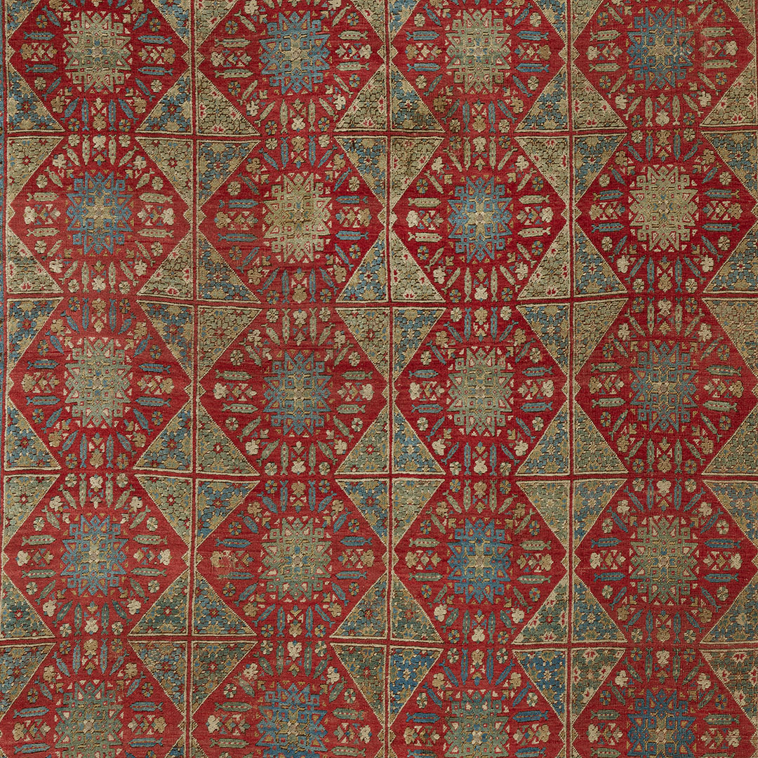 red and green textile with repeating diamond design