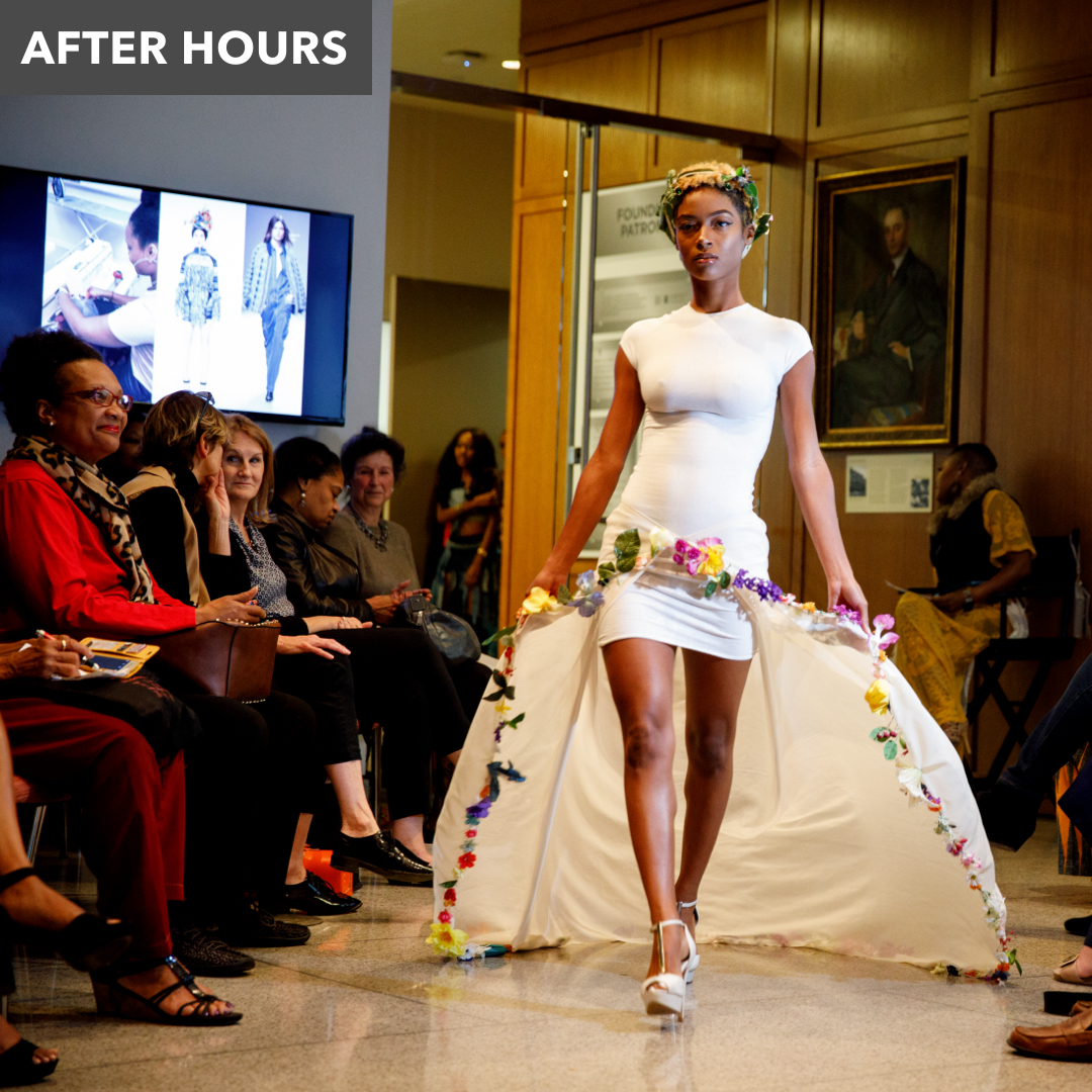 woman struts down a runway