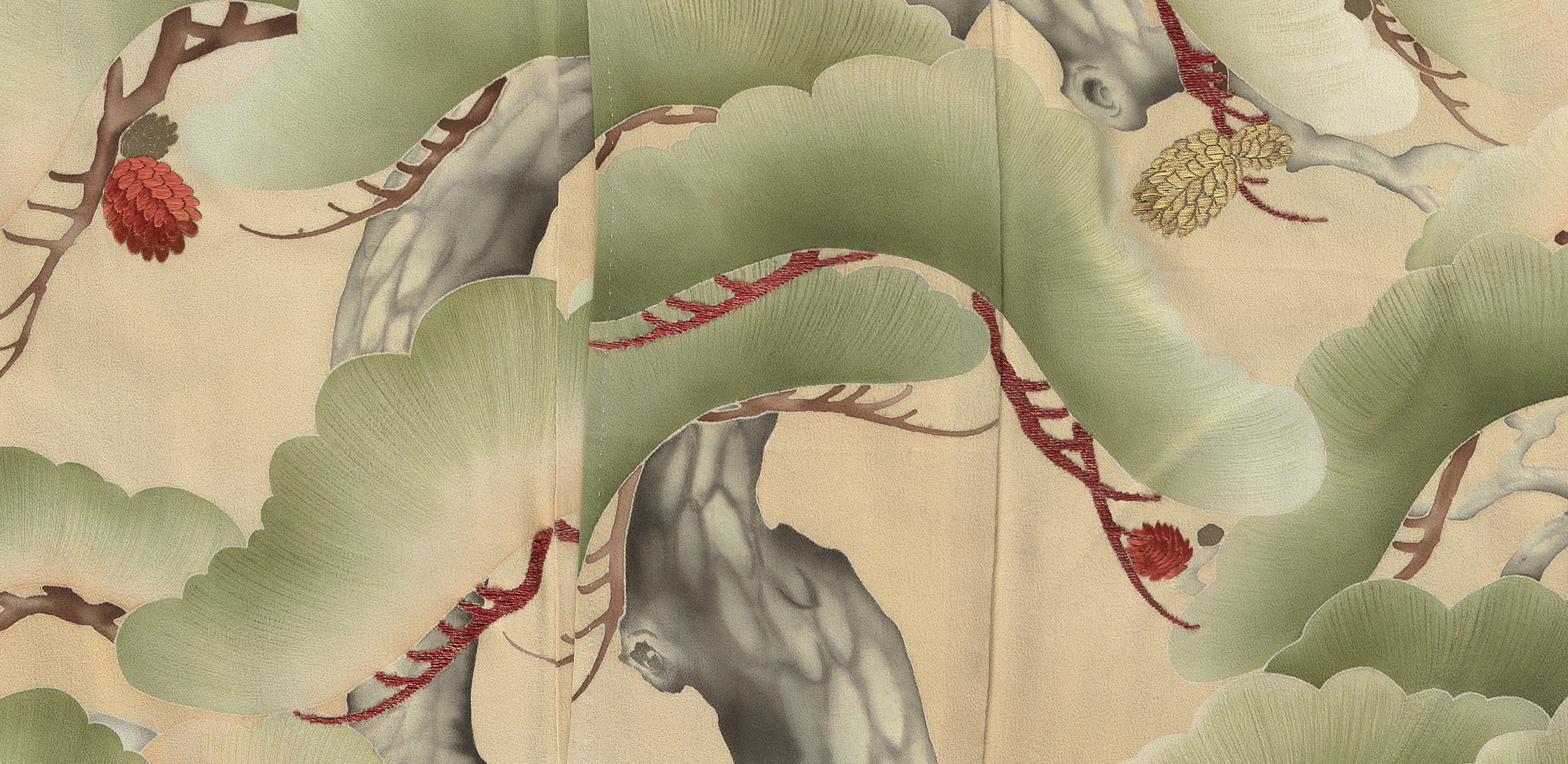 detail of pine trees decorating a kimono