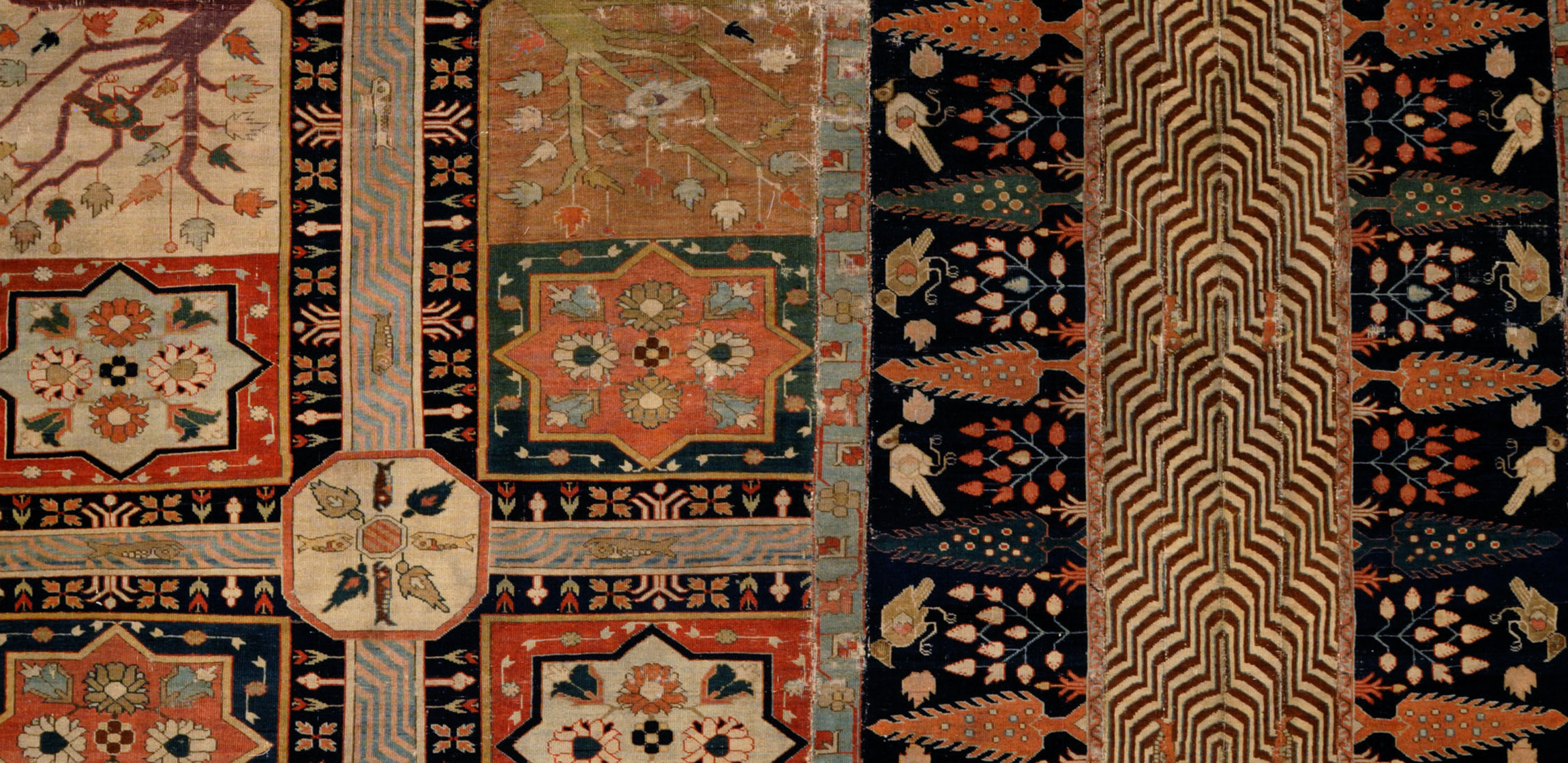 detail of a brown textile with beige medallions