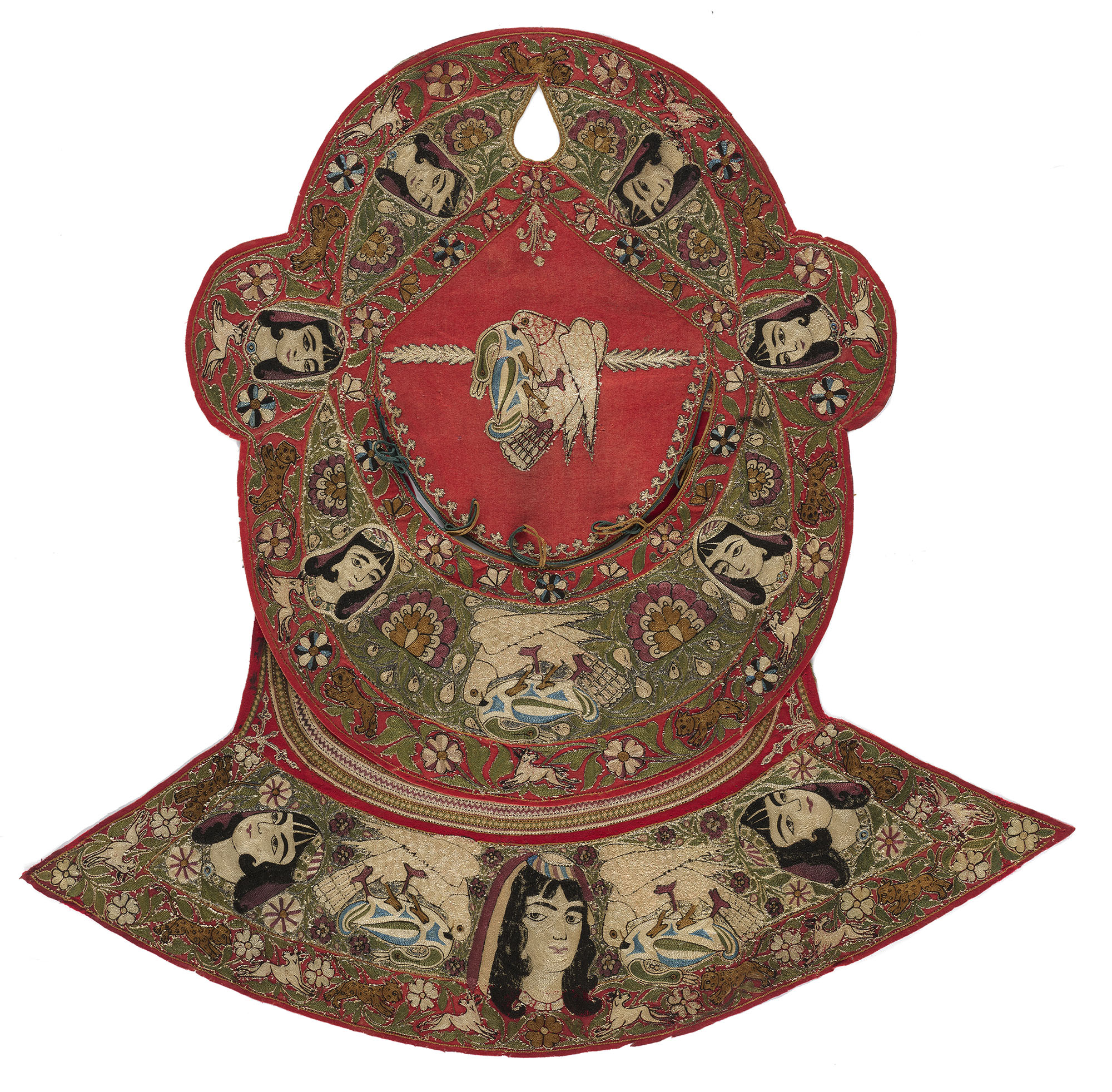 head shaped textile with small embroidered figural elements