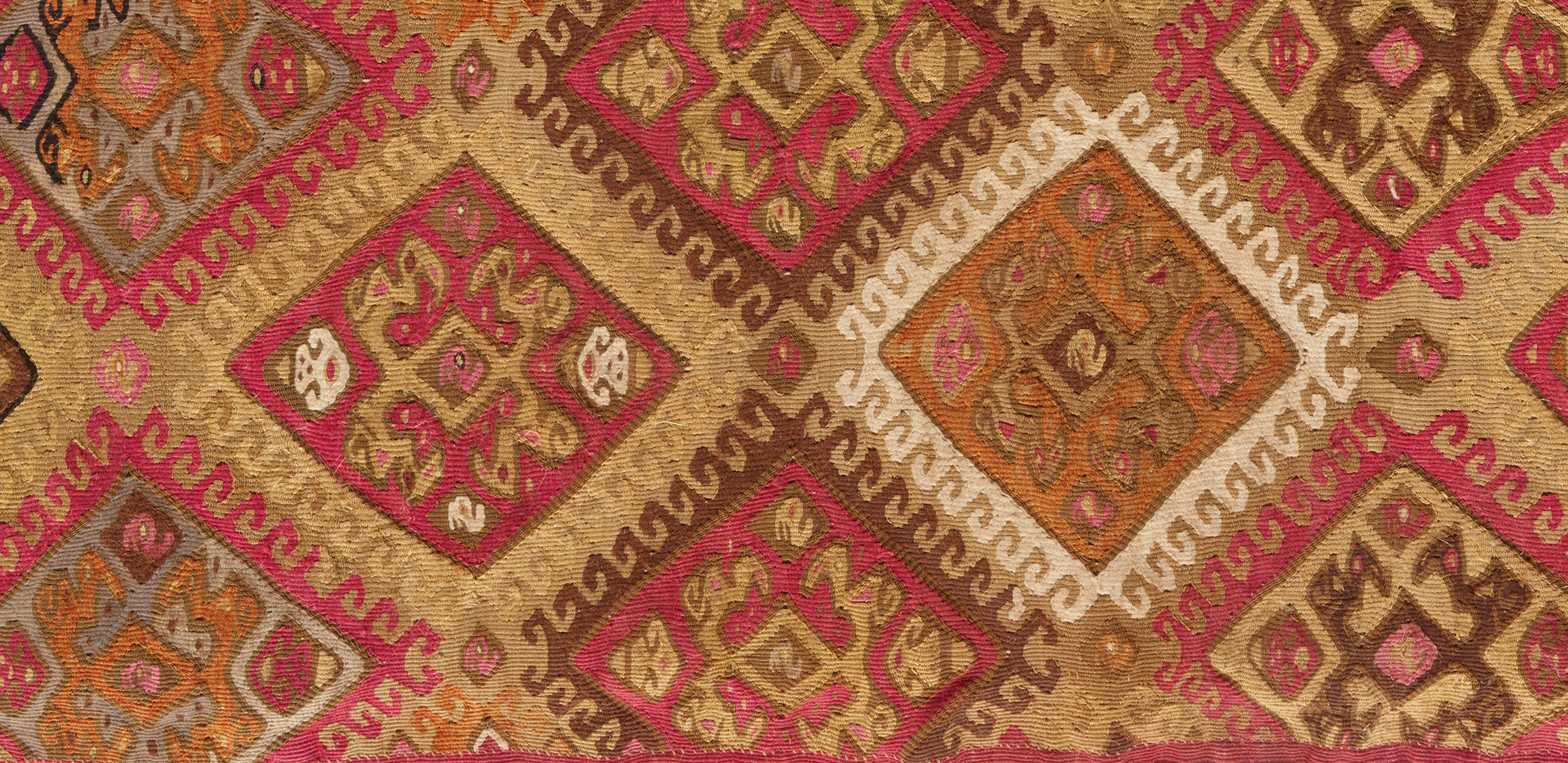 detail of an inhan tunic with diamond pattern