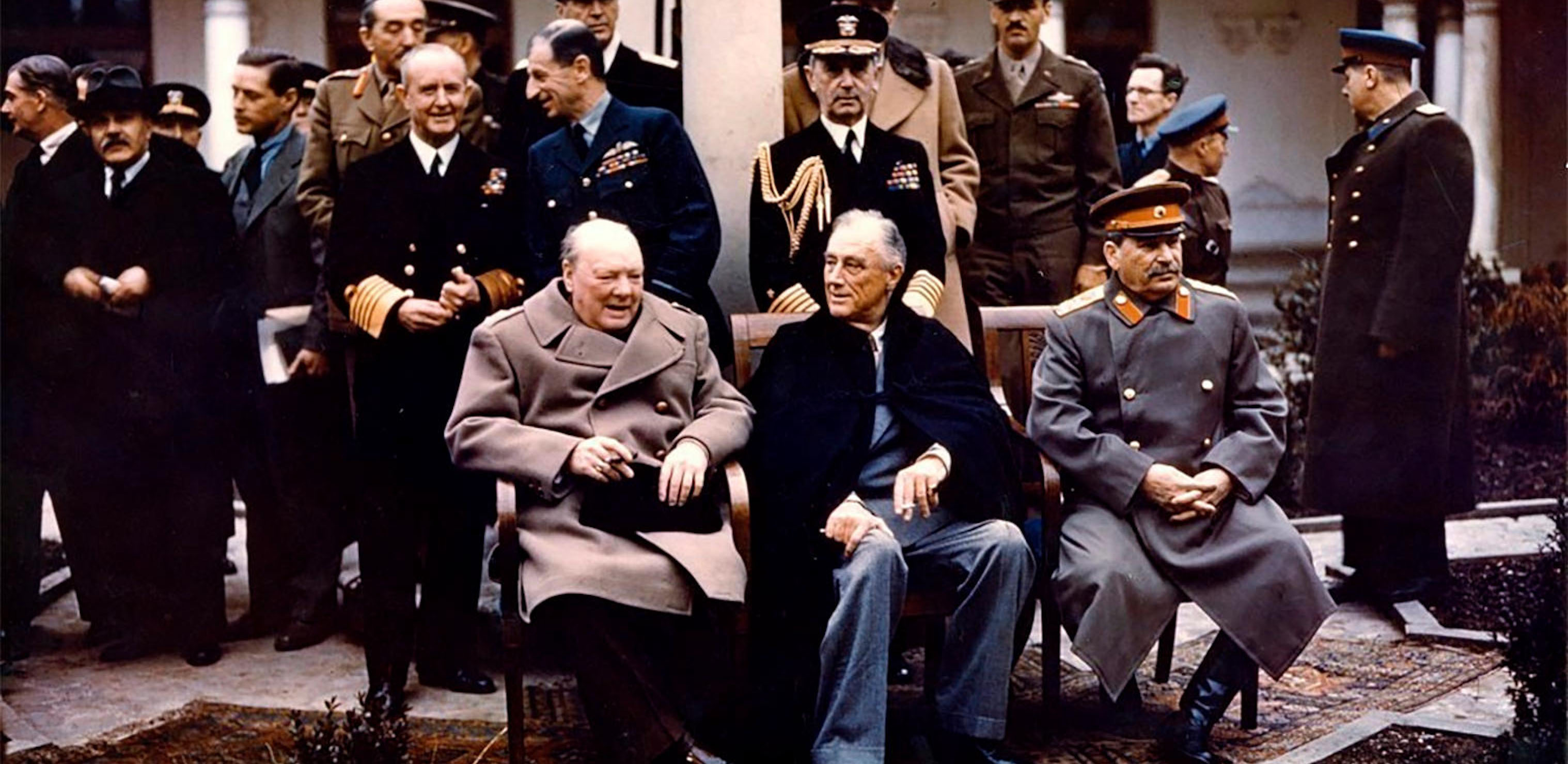 FDR< Stalin and Churchill sit together for a photo