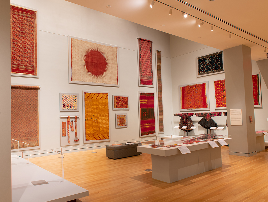 Gallery with colorful display of textiles