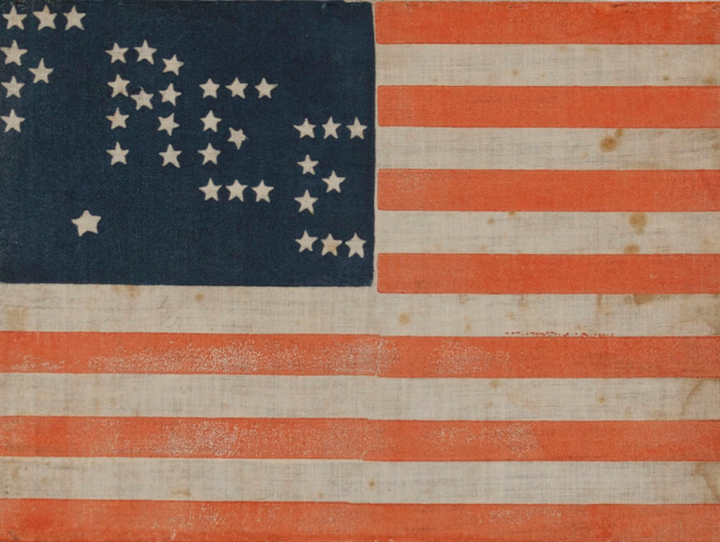 U.S. flag with stars spelling the word free