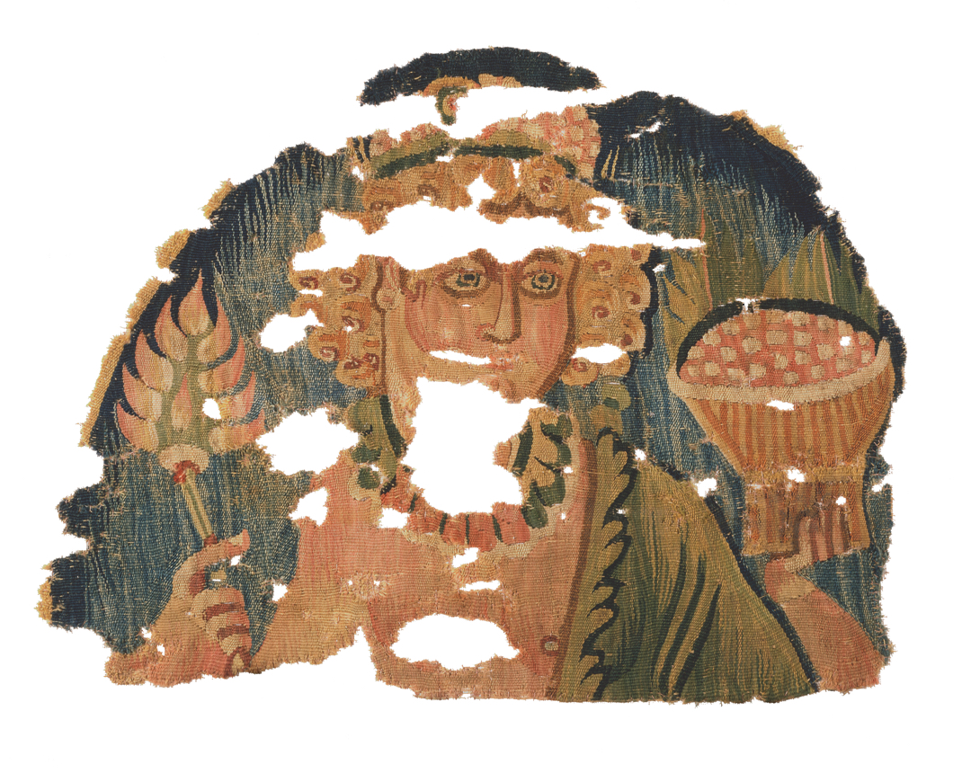 Textile fragment showing figure holding basket