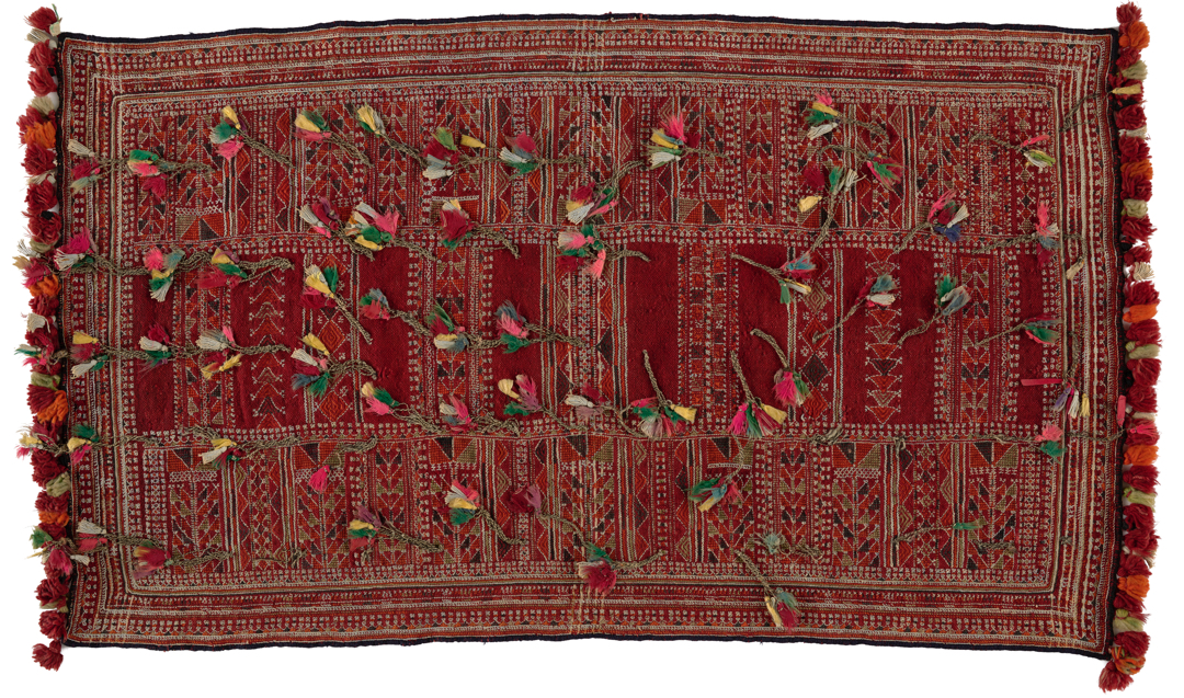 Red textile with tufts