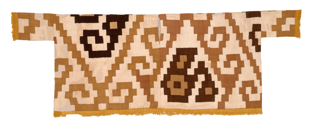 tan tunic with geometric pattern