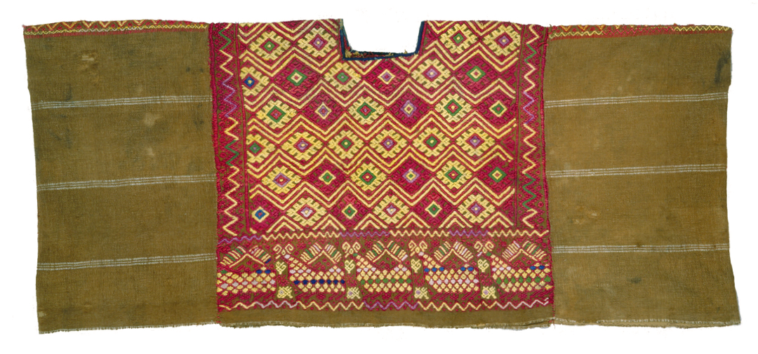 green garment with heavily brocaded panel