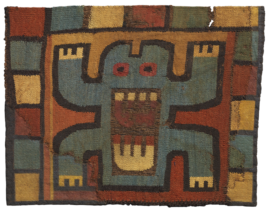 Textile showing frog with teeth