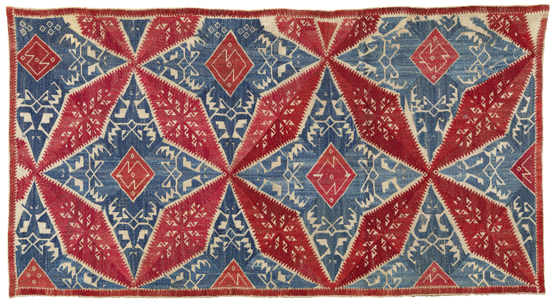 red and blue embroidery with geometric design