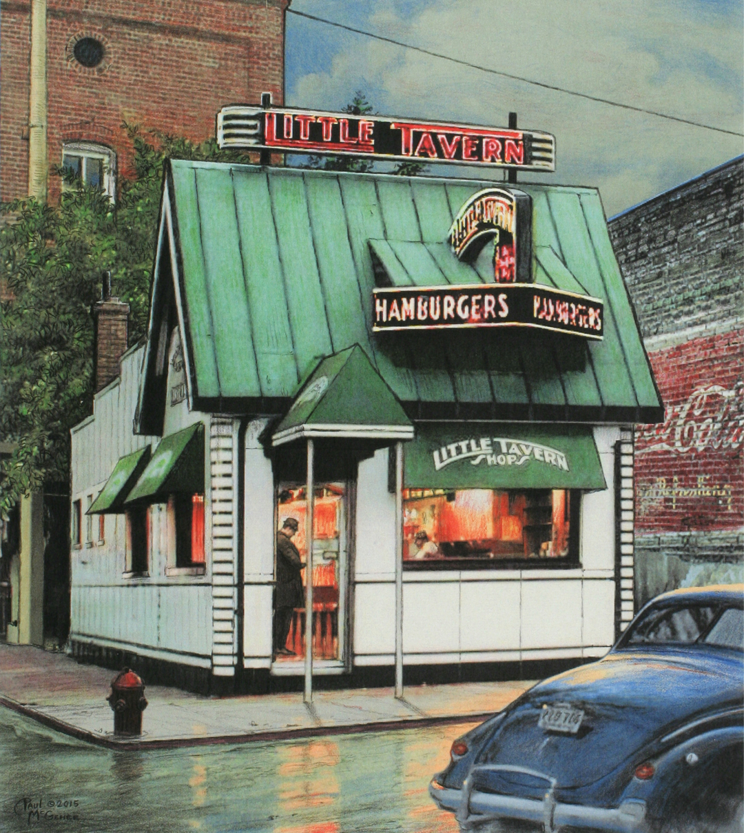 Tiny white restaurant with peaked green roof and illuminated front window