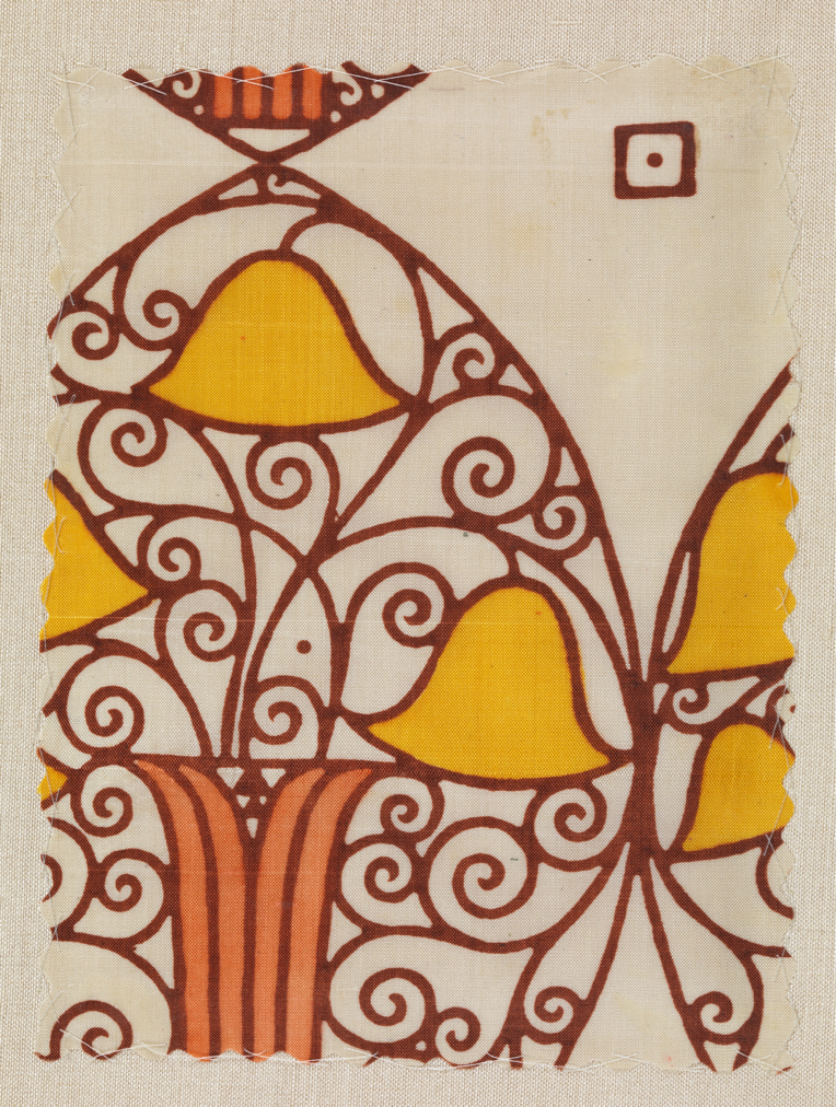 Cream-colored textile with a pattern of yellow bells and brown scrolls