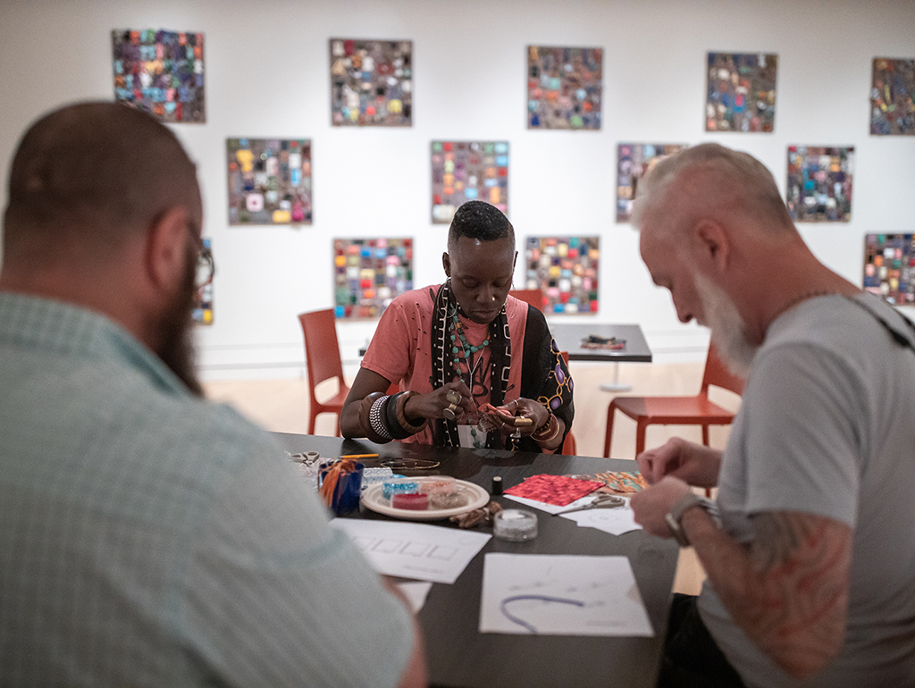 Visitors create their own beaded prayers