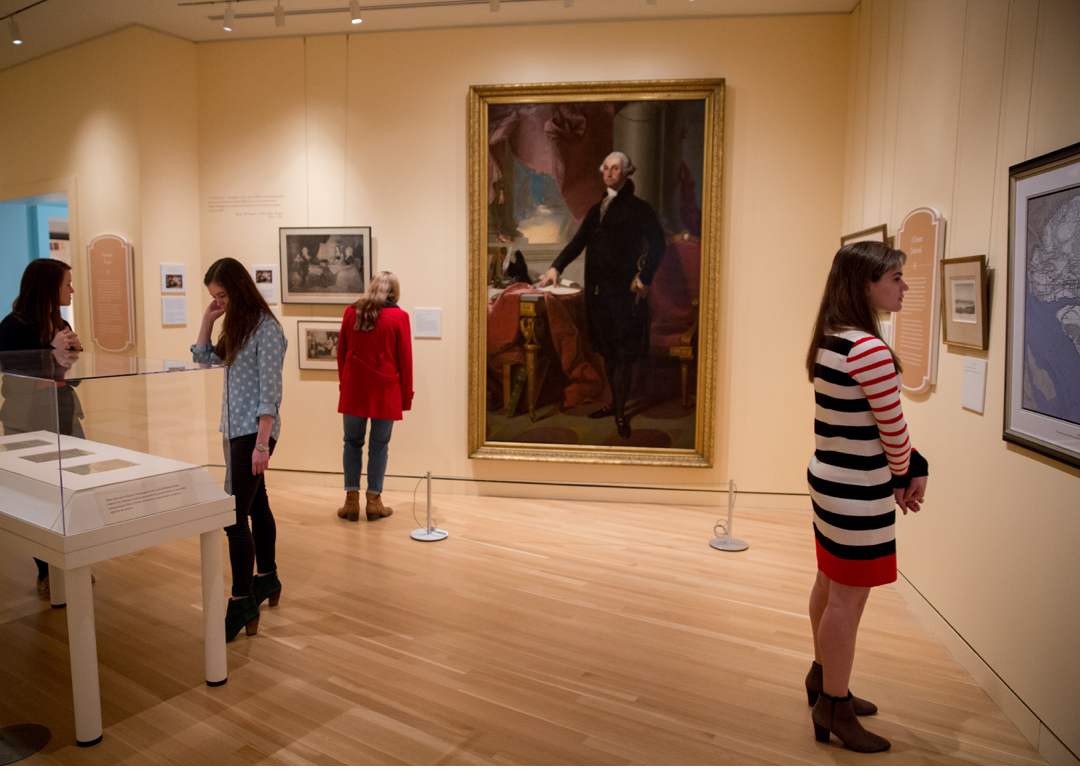 Students in exhibition gallery