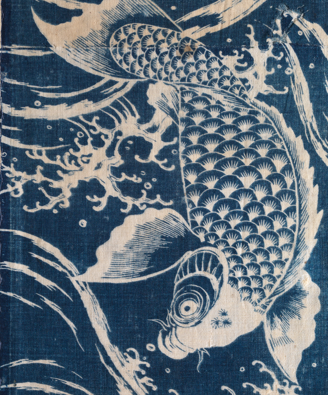 Tapestry with a blue fish
