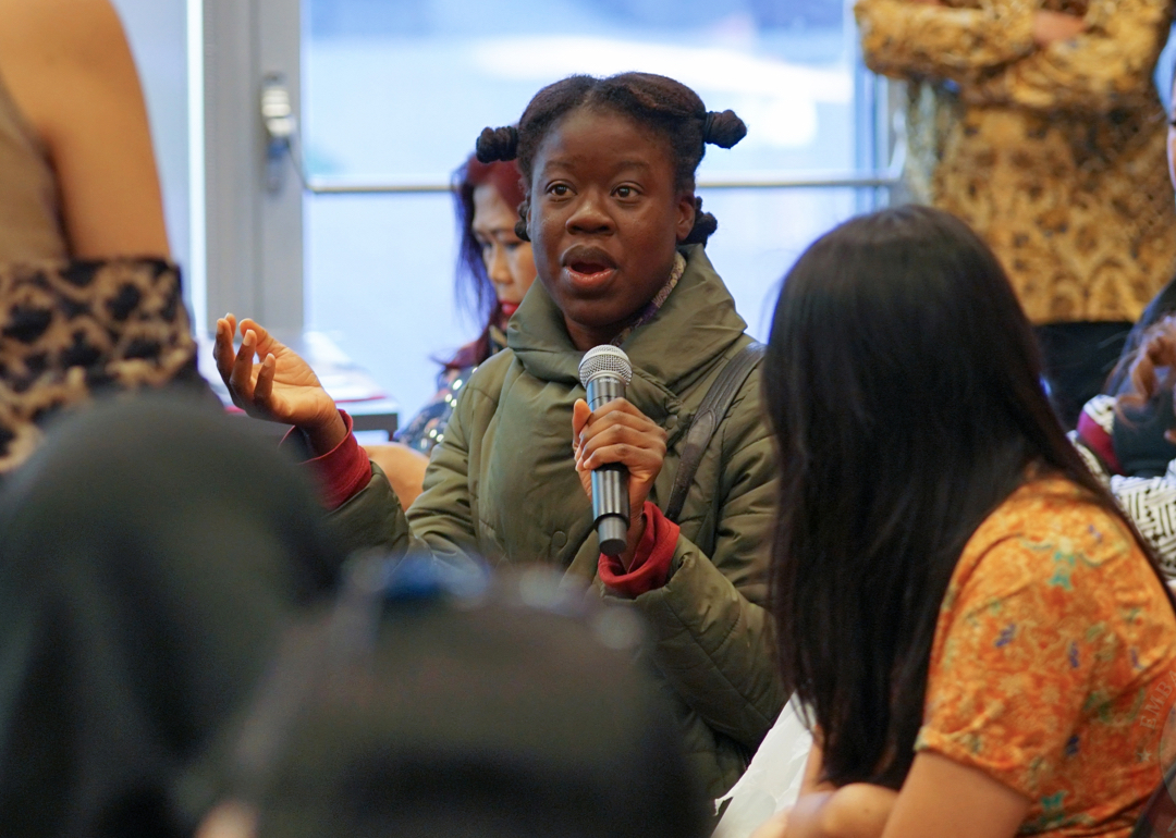 Girl speaking in microphone