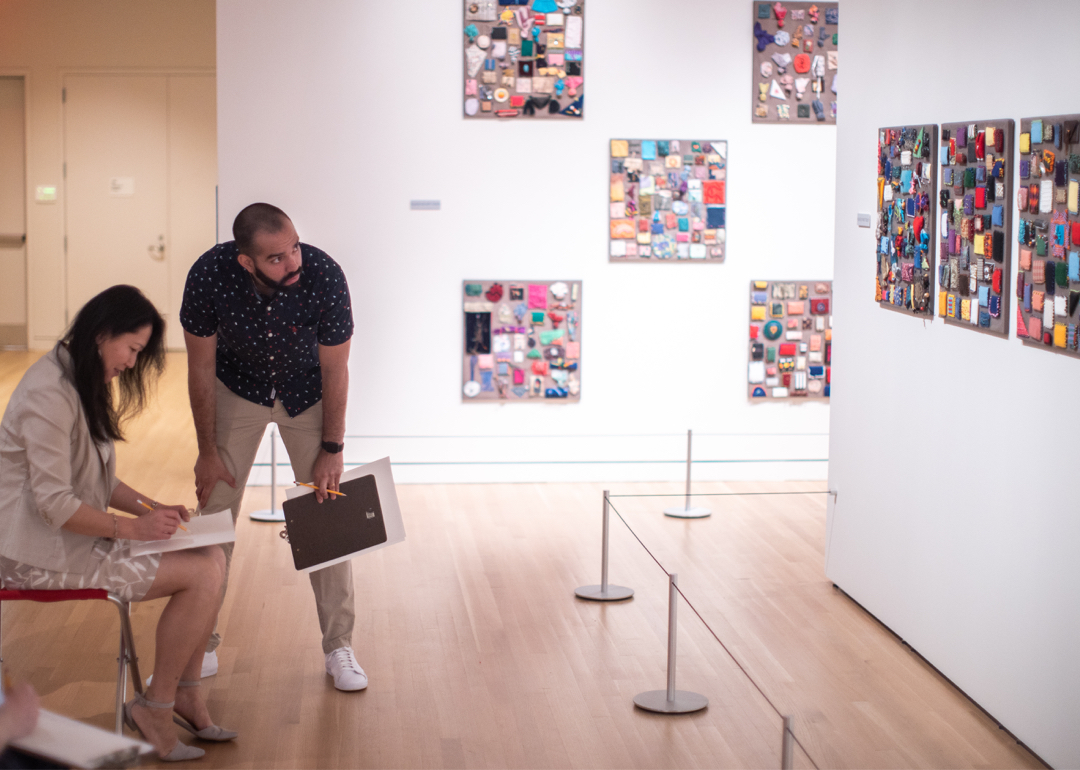 Instructor with a student in the galleries
