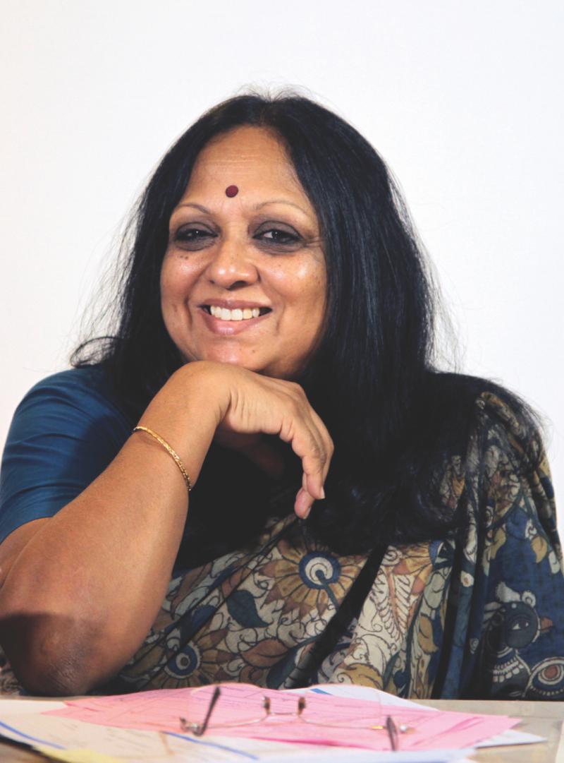 An Indian woman smiling
