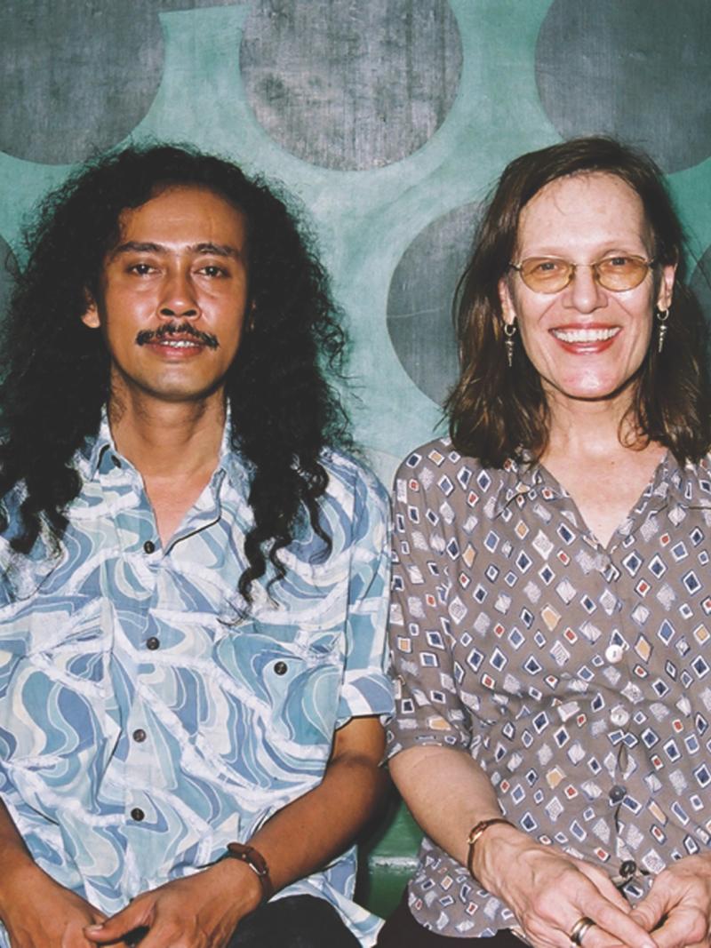 Man and woman seated next to one another