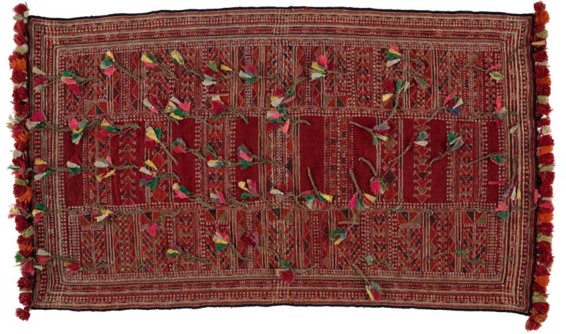 Red textile with tufts