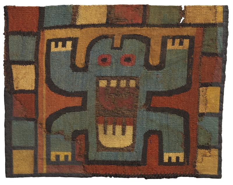 Textile showing frog with teeth