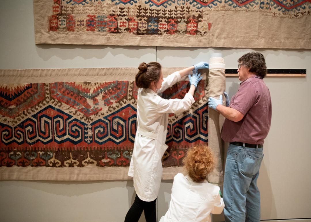 People hanging textile