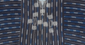 Detail of navy ikat tunic with stripes
