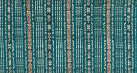 Teal-colored ikat textile with vertical stripes