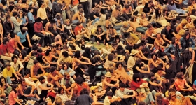 1971 poster showing a large crowd at an outdoor music festival