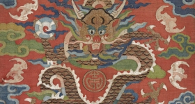 detail of a textile with a chinese dragon motif 