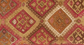 detail of an inhan tunic with diamond pattern